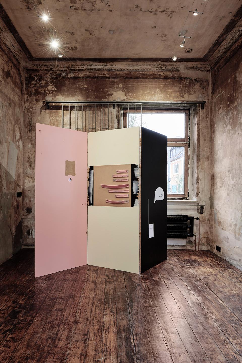 Mortadella statistics, 2020,Paravan with video loop and publication (Sausage Operations - short manual), pressboard wood, brass hinges and screws, plastic foil, acrylic paint,ca. 220 x 300cm