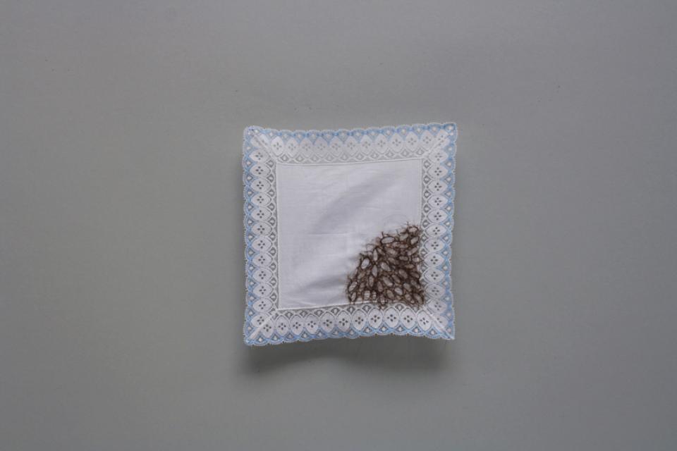 no title, 2015,head hair, ladies handkerchief, pin needles,27 x 27 cm