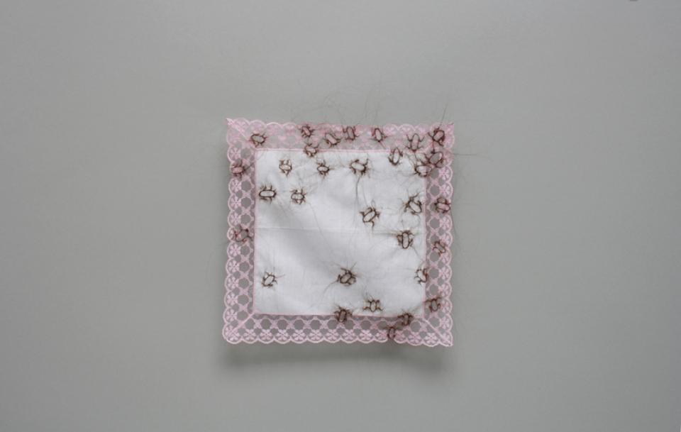 no title, 2015,head hair, ladies handkerchief, pin needles,28 x 29 cm